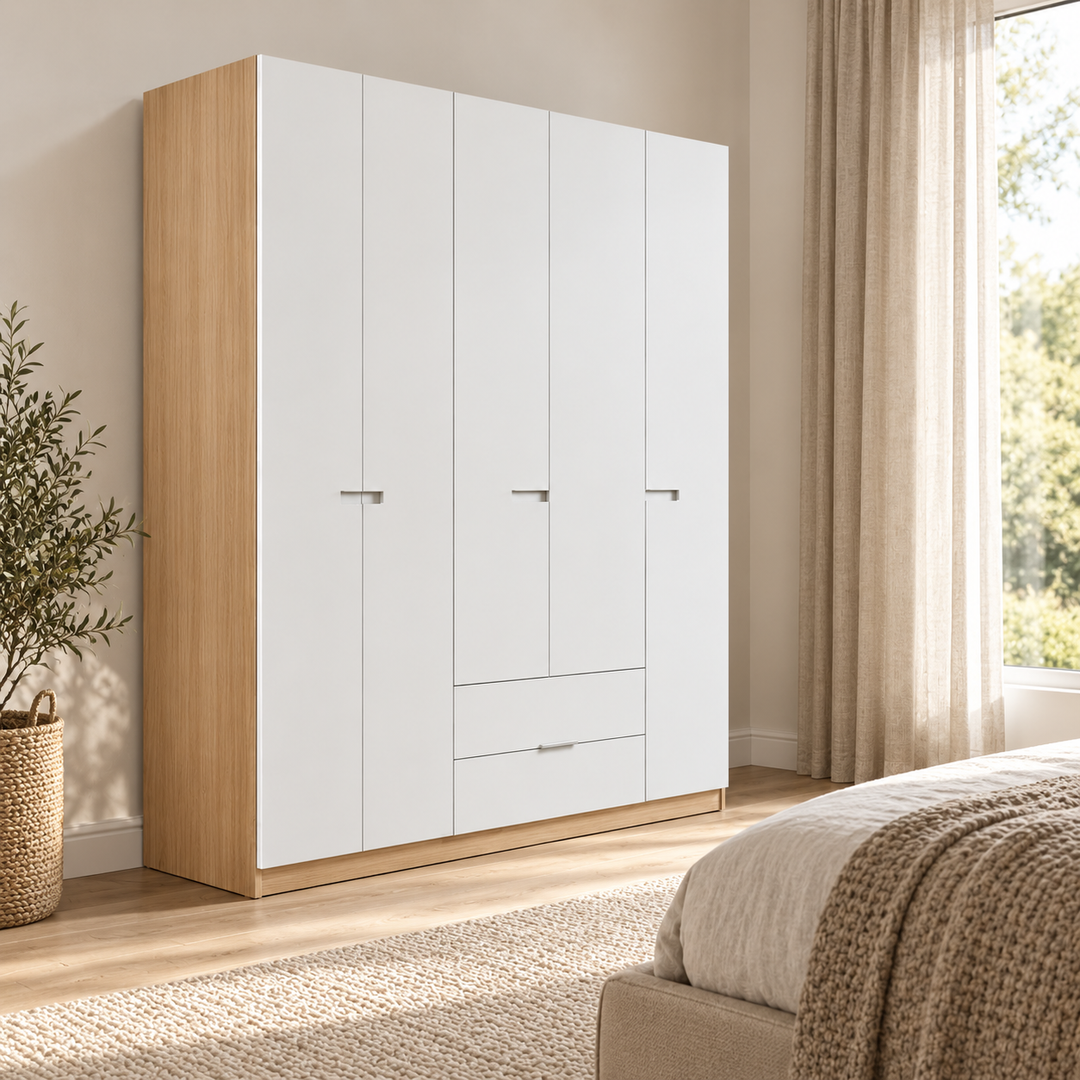 Urakatara wardrobe with white doors, lower drawers and wood-toned side panels in a bedroom
