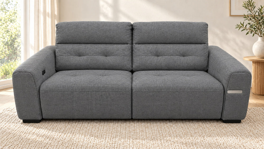 Leo two-seater recliner sofa – monelli-10-charcoal-grey – in a living room
