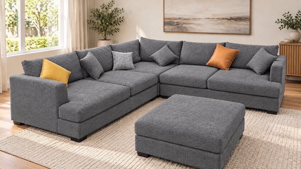 Sophie corner sofa with one matching ottoman in a living room — Monelli 10 — Charcoal Grey