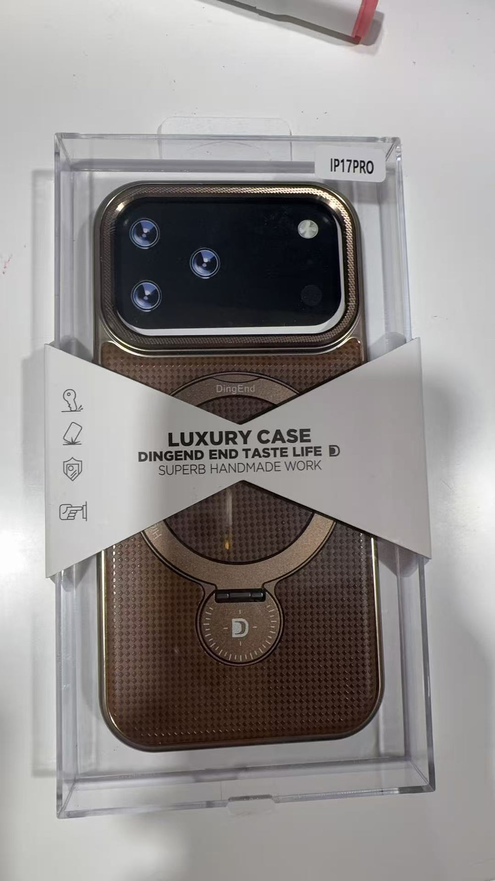 Actual iPhone 17 Pro brown-gold RING case packaging