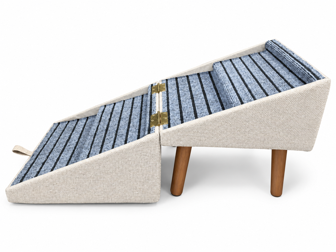 Folding pet steps open on white background