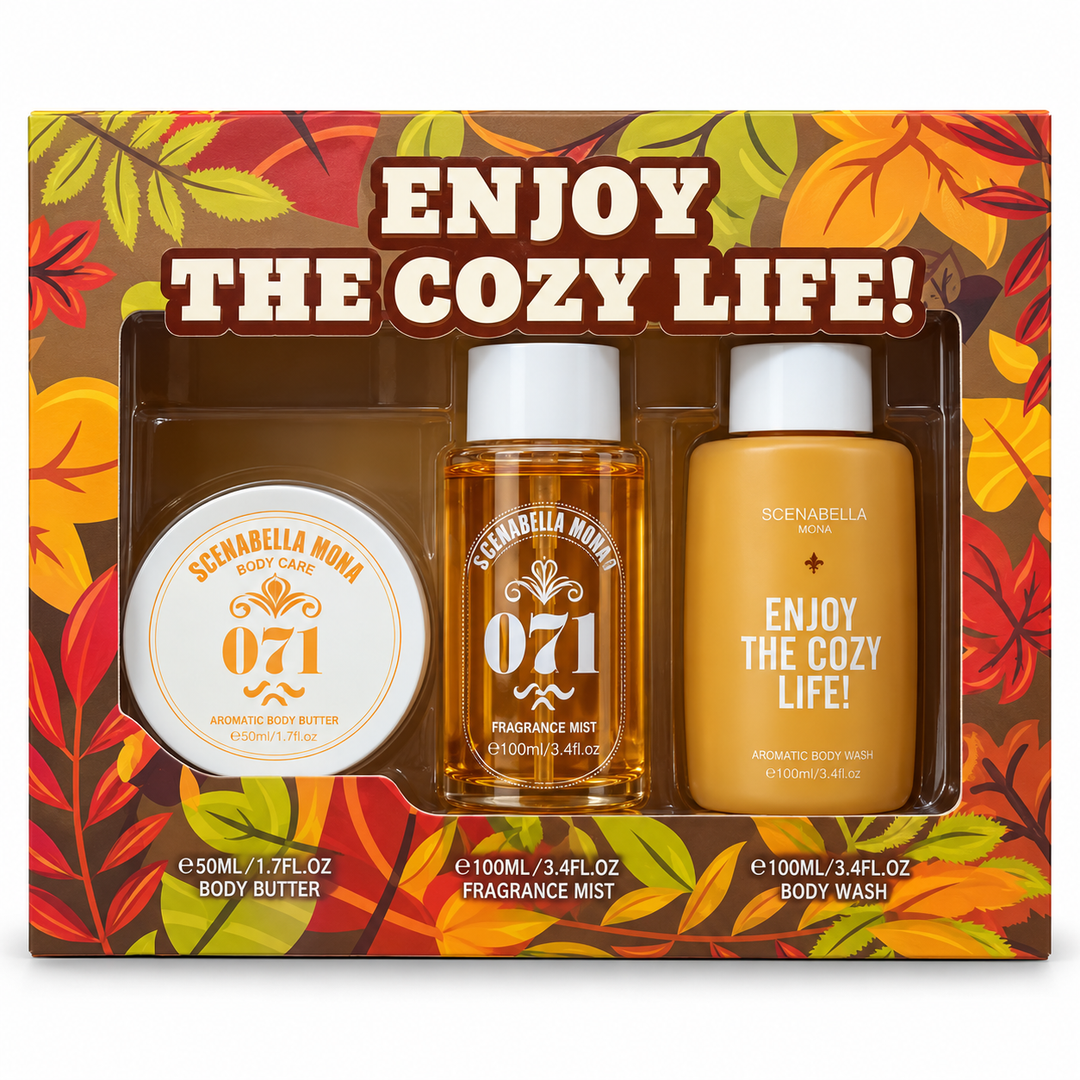 Enjoy the Cozy Life gift box containing a body butter tub, fragrance mist bottle and body wash bottle in orange and yellow packaging