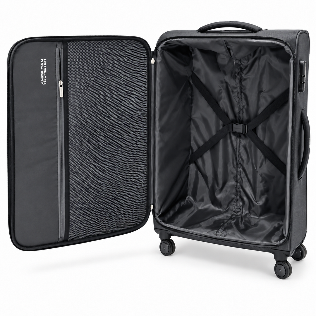 American Tourister suitcase interior with mesh divider and cross packing straps