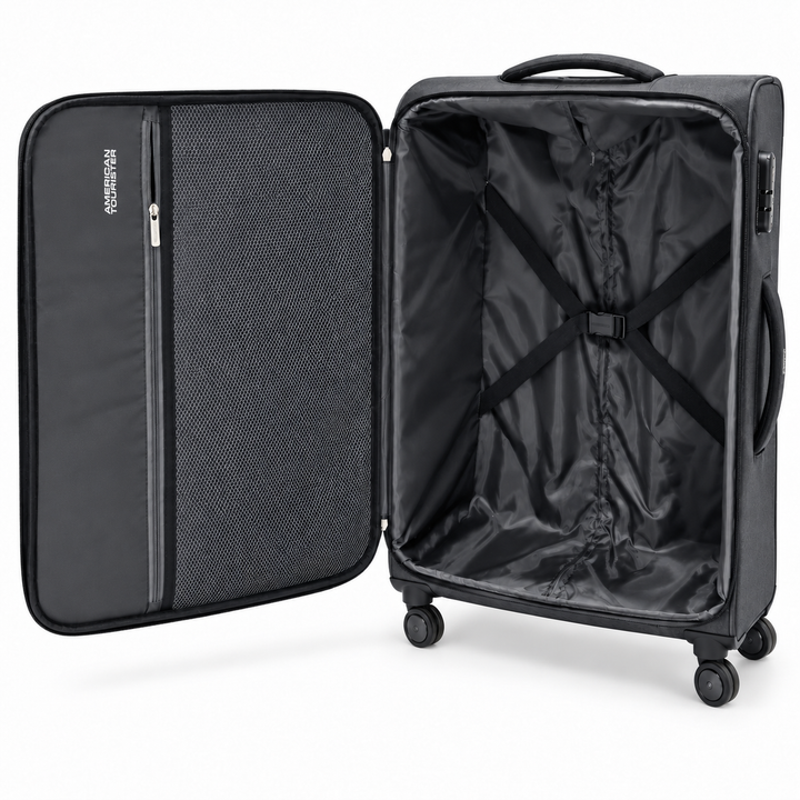American Tourister suitcase interior with mesh divider and cross packing straps