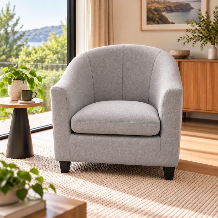 Grey tub armchair in a living room