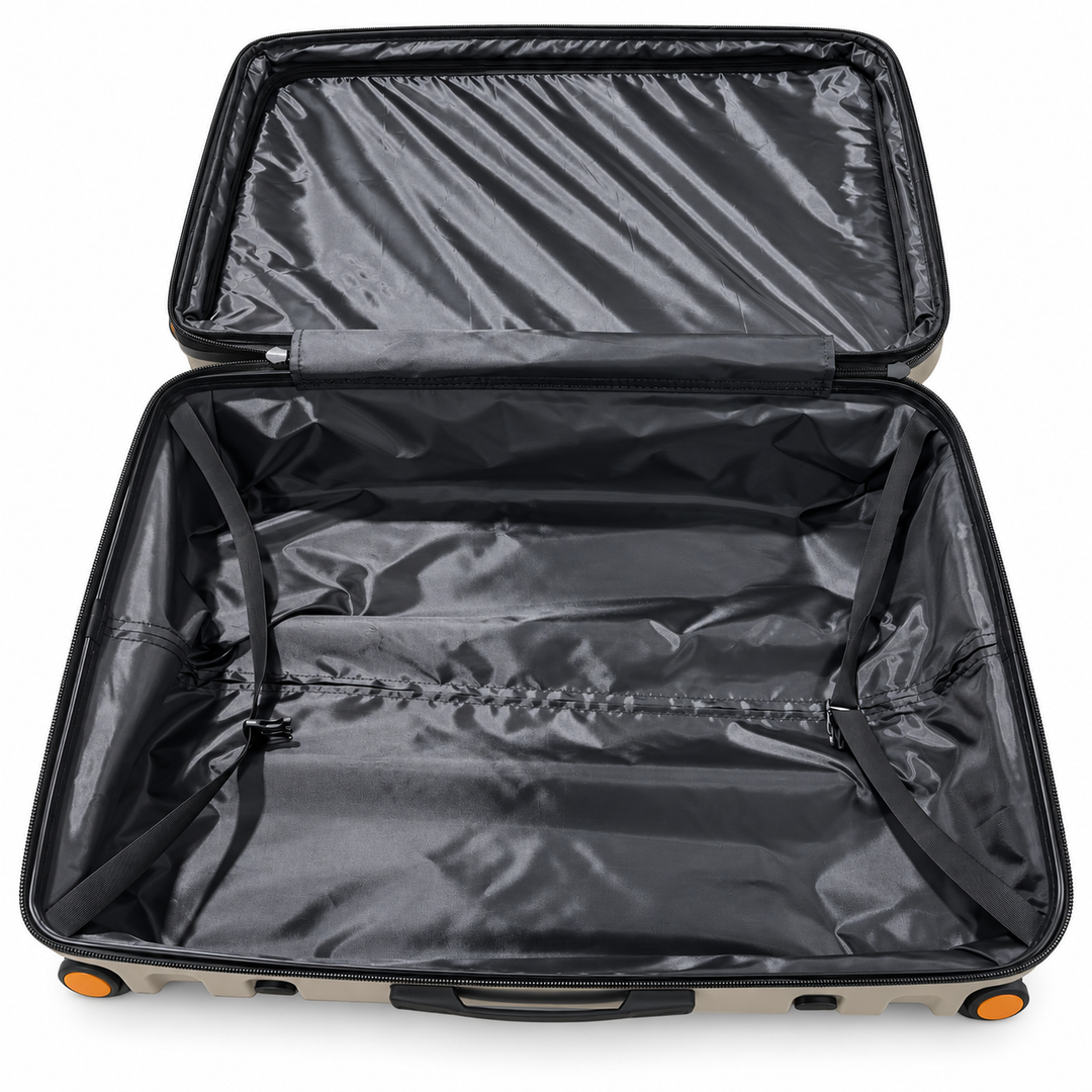 Fiesta suitcase laid open showing lined packing compartment and retaining straps