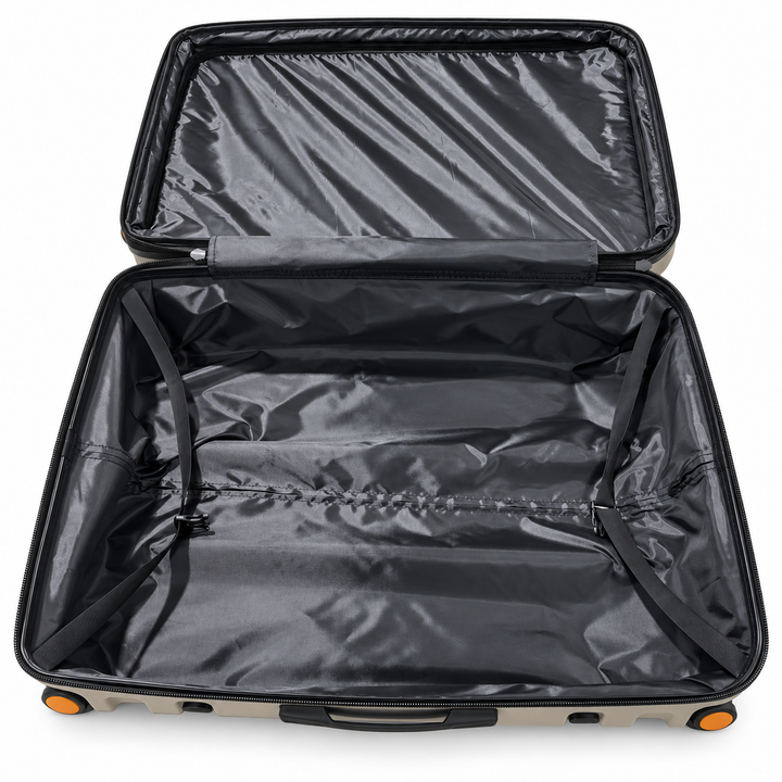 Fiesta suitcase laid open showing lined packing compartment and retaining straps