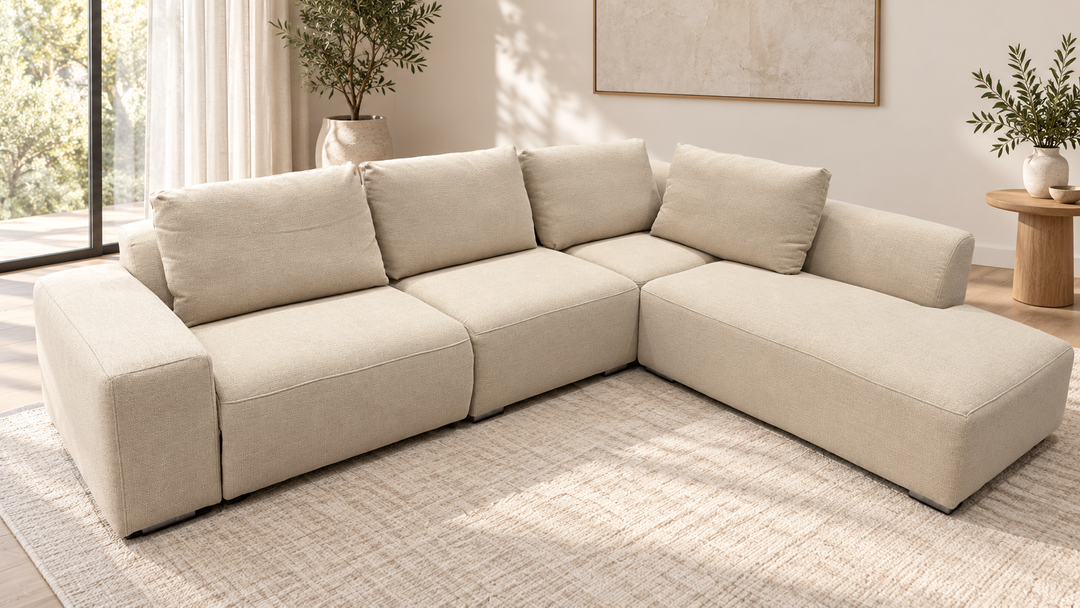 Oscar right-hand corner sofa in cream, with chaise on image right, shown in a living room