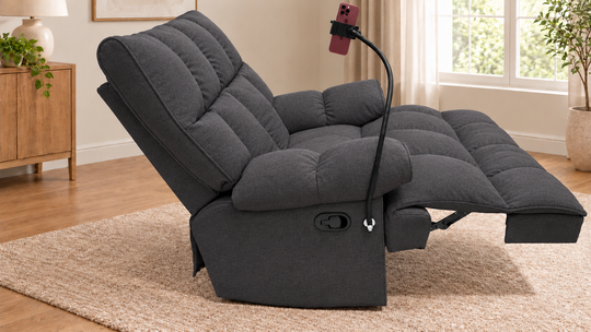 Victoria Plush Recliner Chair - Monelli 10 — Charcoal Grey - living room with phone holder and illustrative iPhone