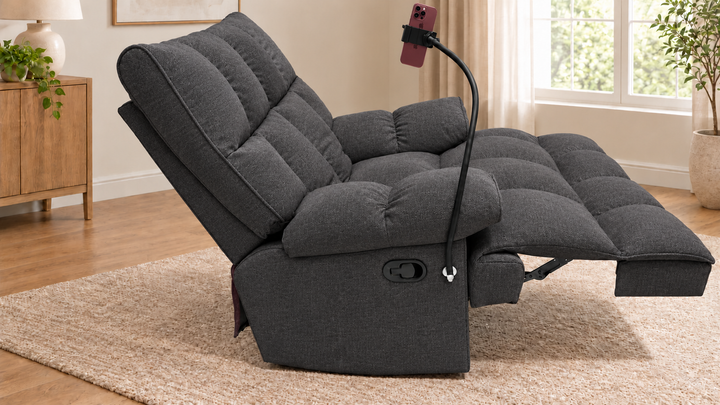 Victoria Plush Recliner Chair - Reverb 14 - Charcoal Grey - living room with phone holder and illustrative iPhone
